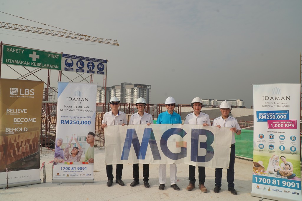 (From left)  Chew, Isaac, Lim, Richard and Victor at the roof topping-up ceremony.