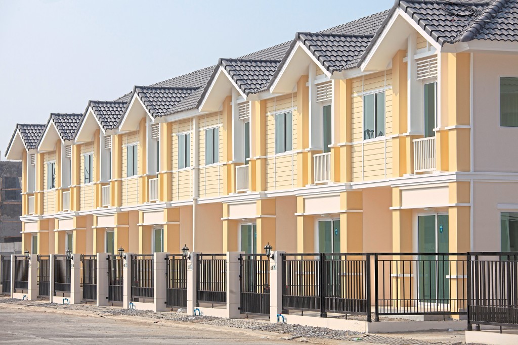 A row of just finished new townhouses